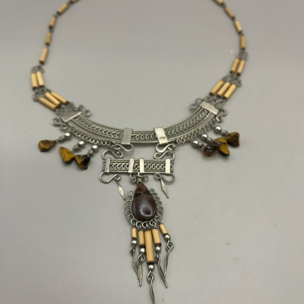 Silver and Brown Tribal Necklace with Intricate Pendant